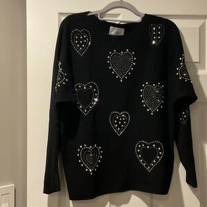 Black Sweater with Heart Embellishments